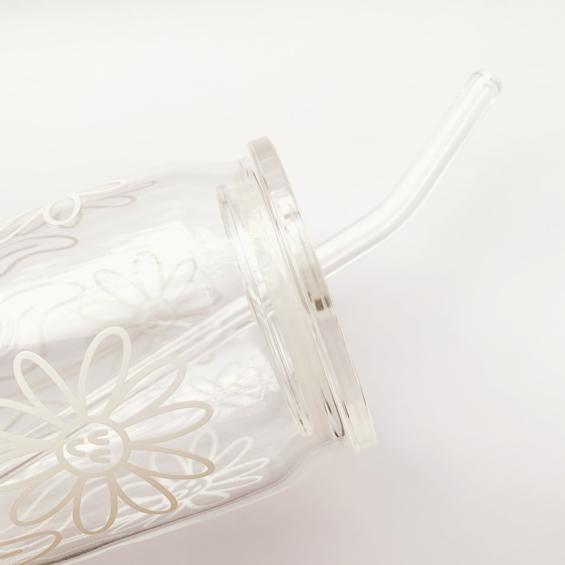 Additional view of acrylic can glass lid showing functional design