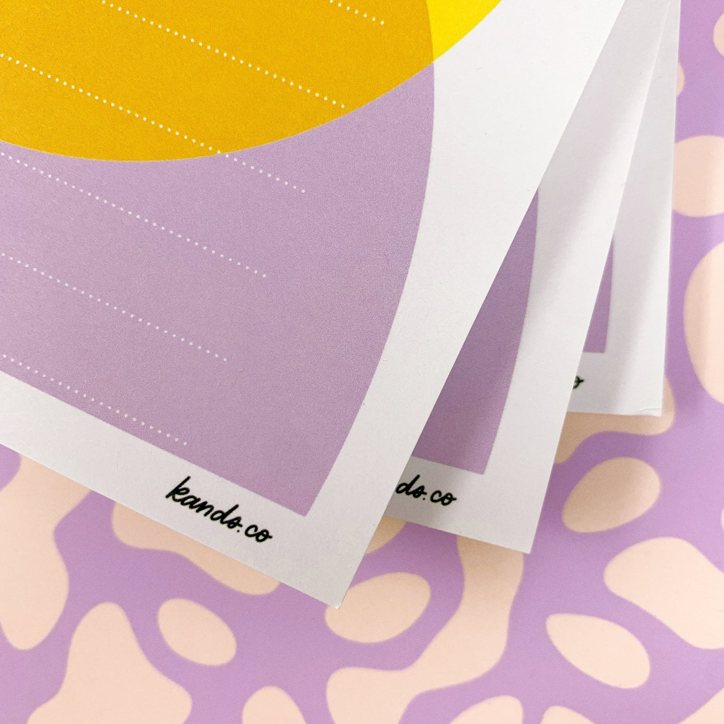 Weekly planner notepad with colorful geometric shapes design