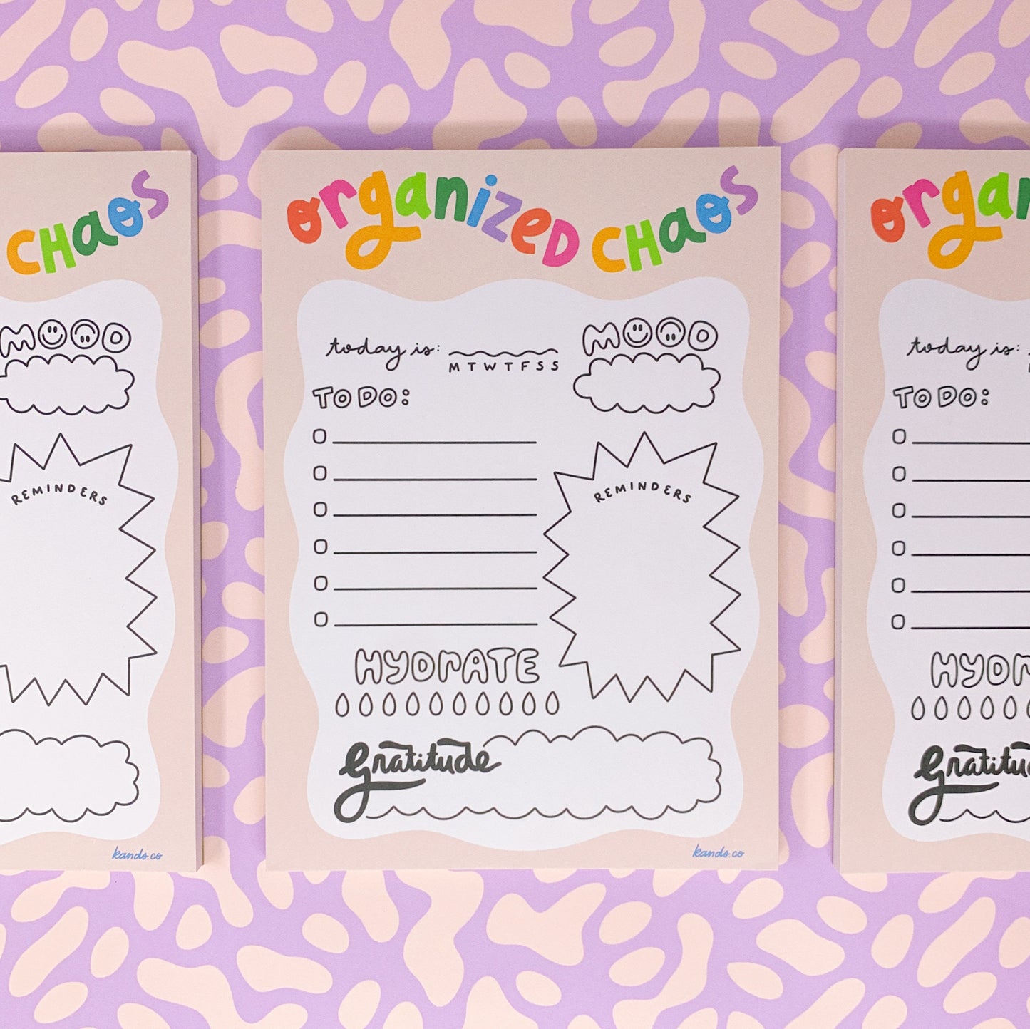 Side view of Organized Chaos notepad showing spiral binding