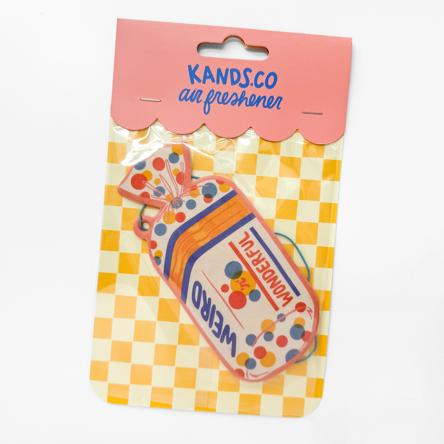 Packaged Weird 'n' Wonderful air freshener showing product