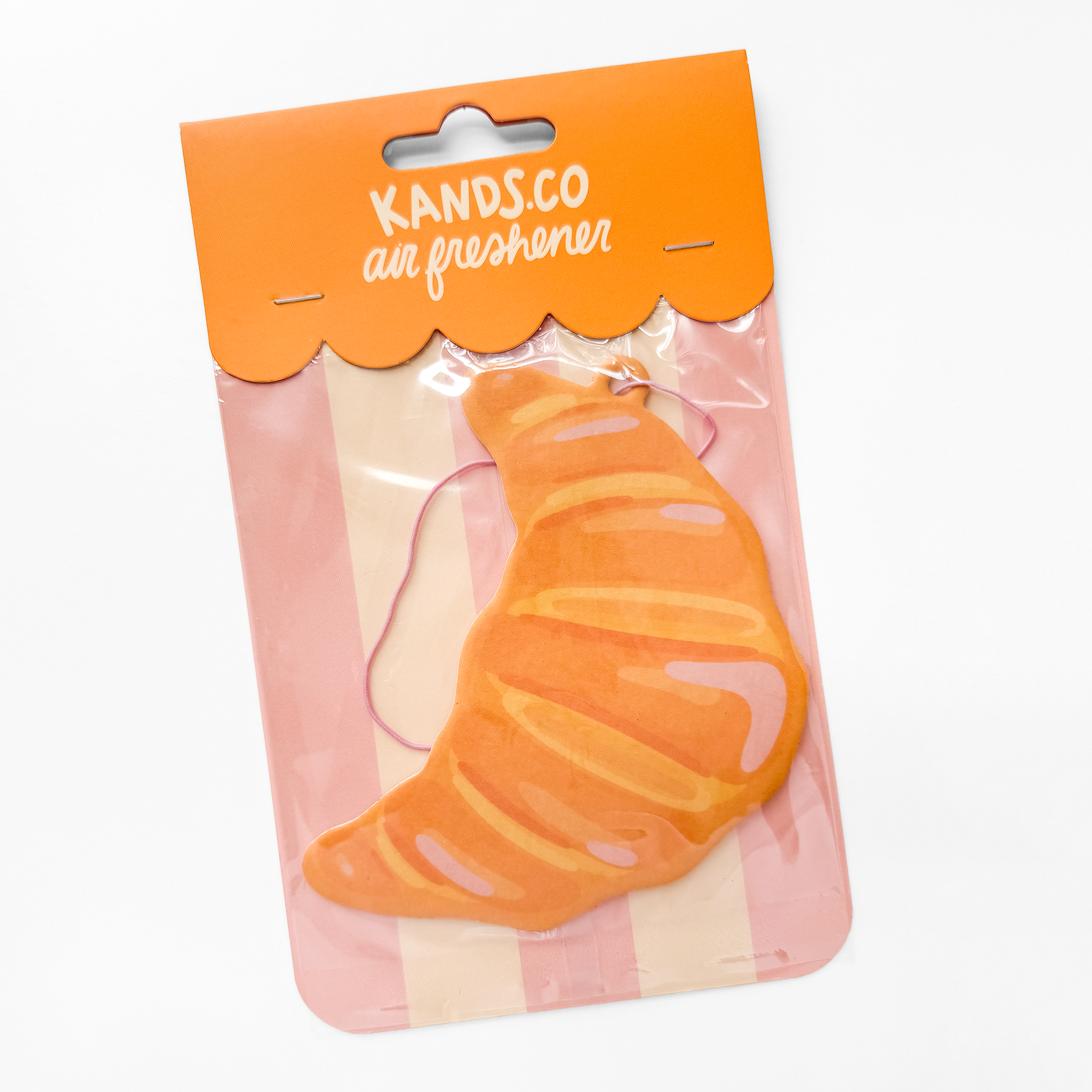 Packaged croissant air freshener showing bakery theme