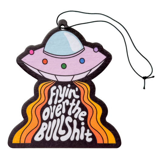 UFO air freshener with 'Flyin' Over the Bullshit' motivational message