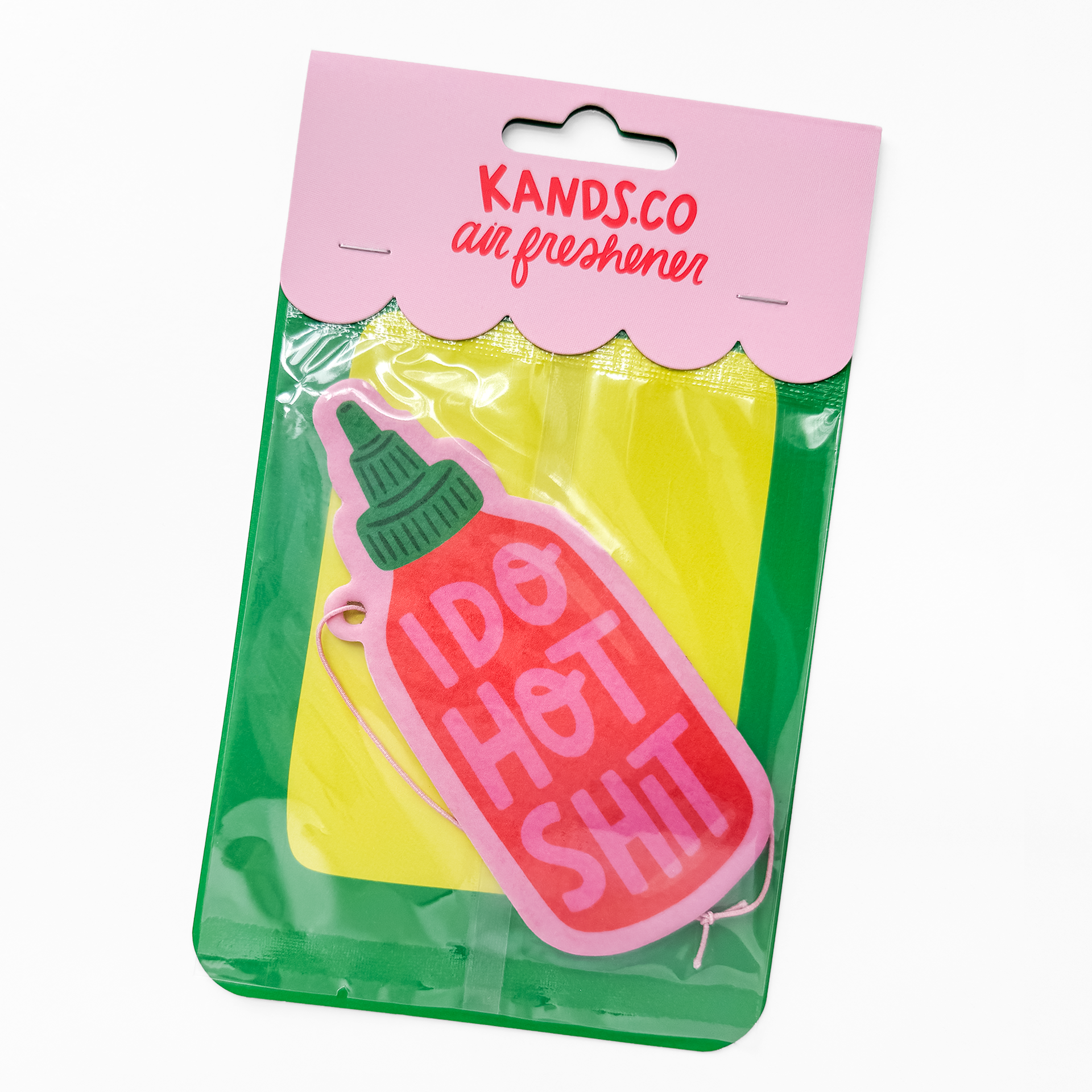 Packaged hot sauce air freshener showing spicy theme