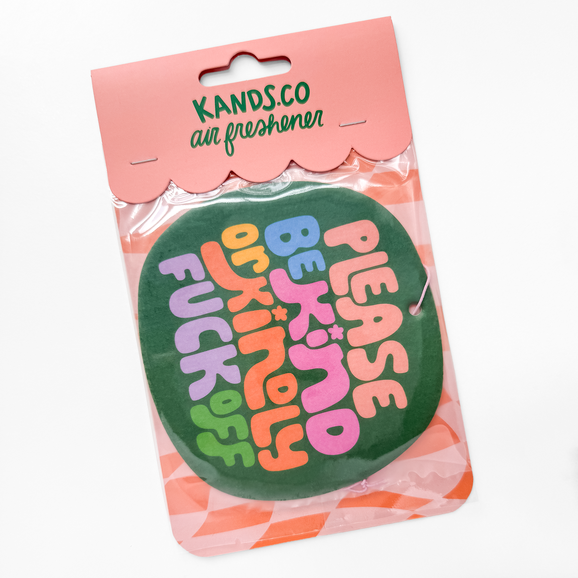 Packaged Please Be Kind air freshener promoting compassion