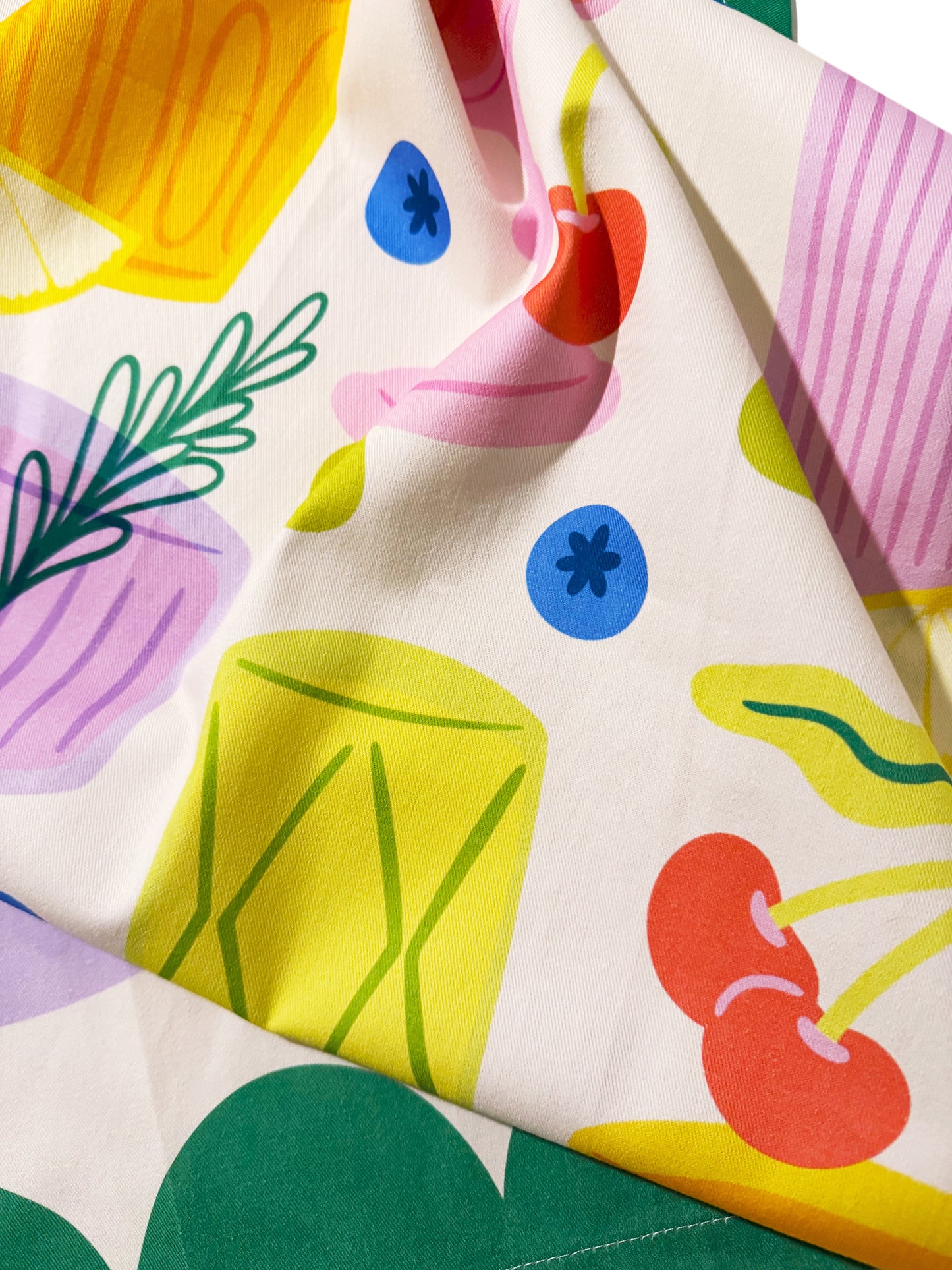 Detail of vintage cocktails tea towel with retro bar theme