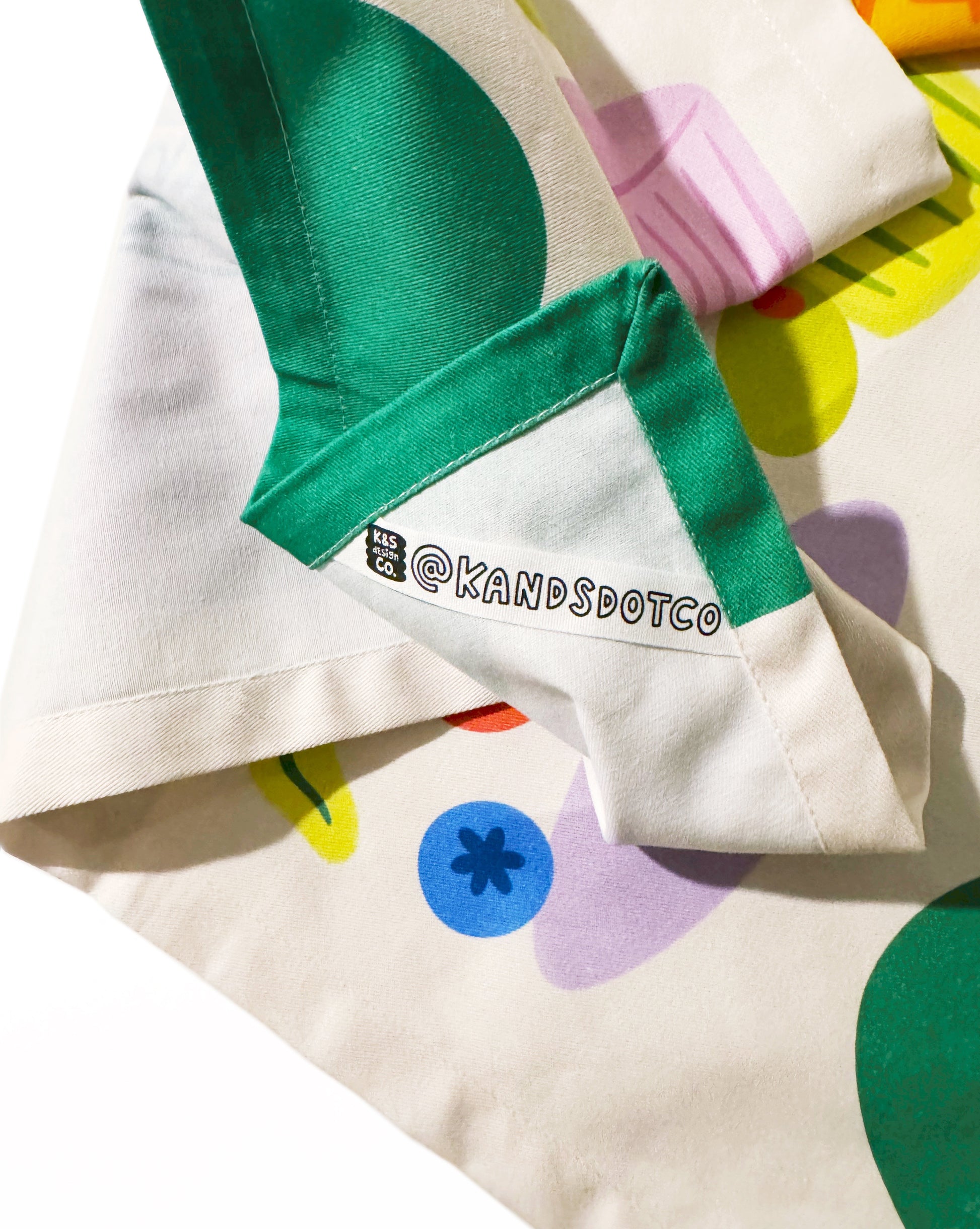 Vintage cocktails tea towel in kitchen setting showing functionality