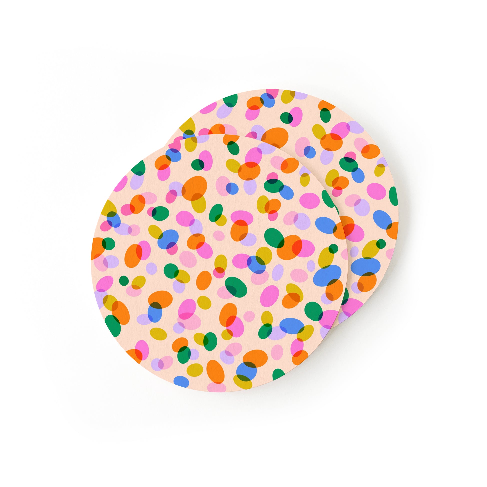 Colorful coasters with confetti dot pattern and festive design