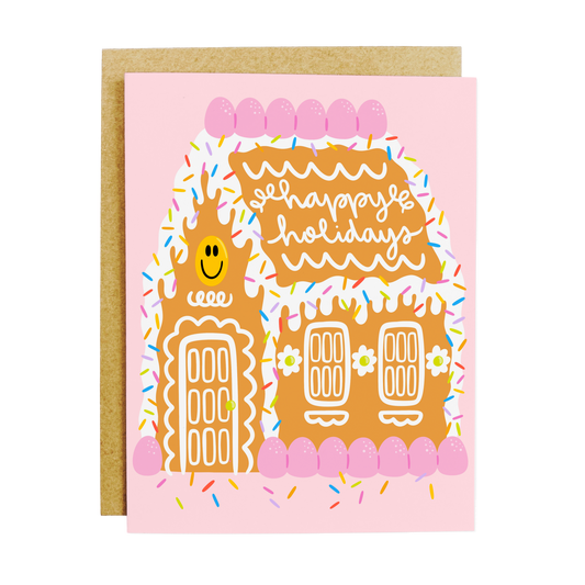 Holiday card with smiling gingerbread house character and festive design