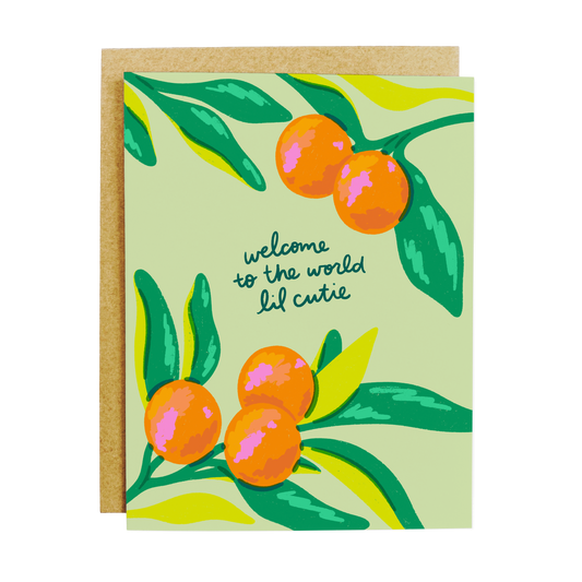 Baby shower greeting card with cute orange illustrations and 'Welcome Lil Cutie' text in playful lettering
