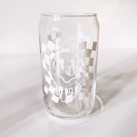 trendy can-shaped glass with drippy smiley face design