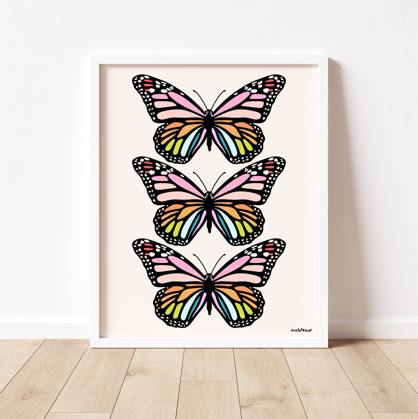 Colorful rainbow butterfly sticker with vibrant wing design