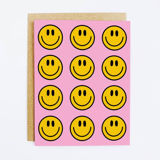 Joyful celebration card with repeated smile face