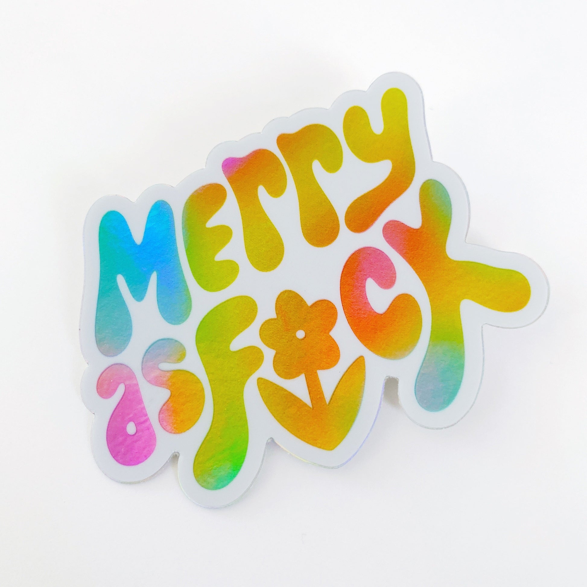 Holiday sticker with 'Merry As Fuck' festive expletive text