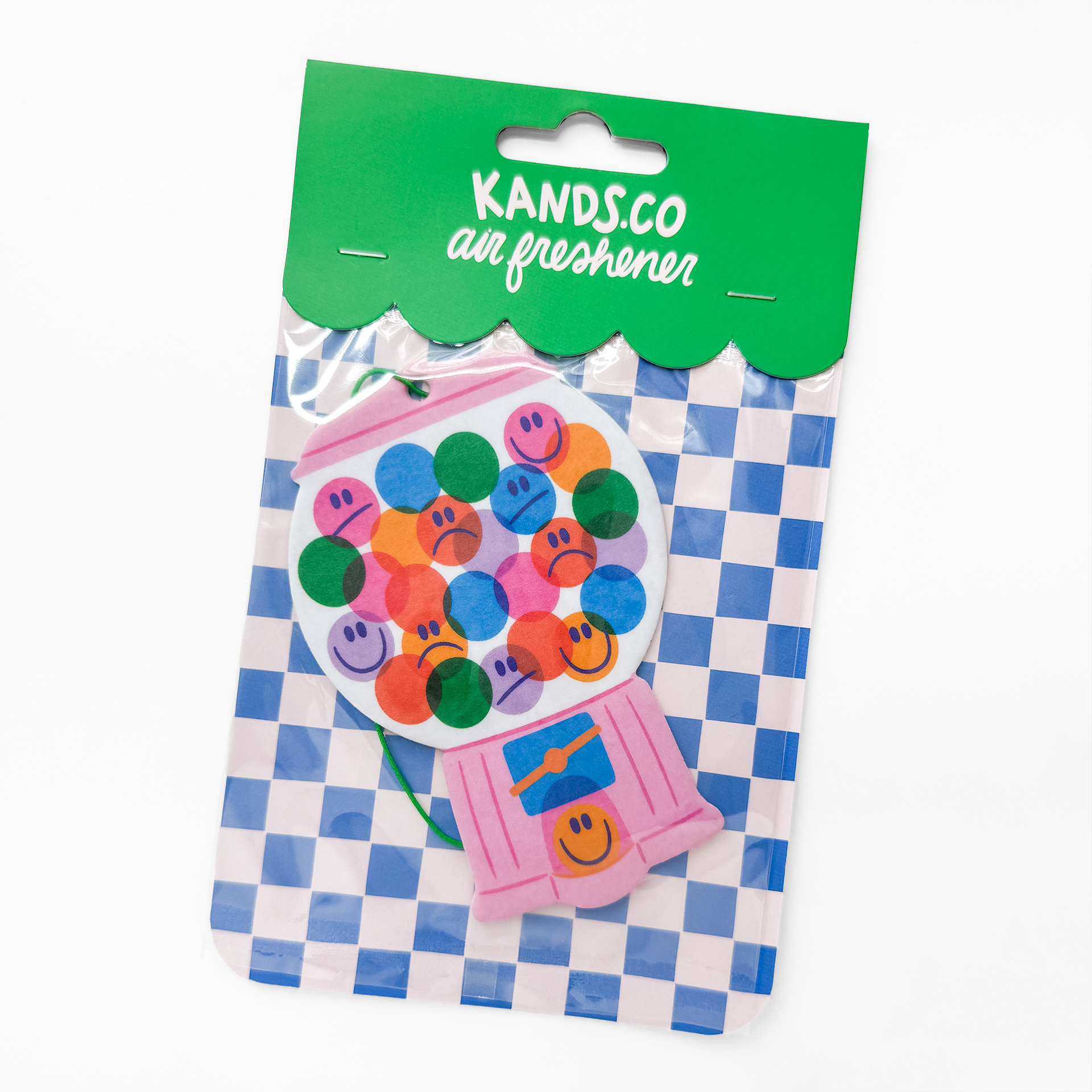 Packaged emotional gumball machine air freshener showing product in clear packaging